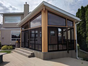 Clear fir and red cedar make this sunroom feel like a warm cottage