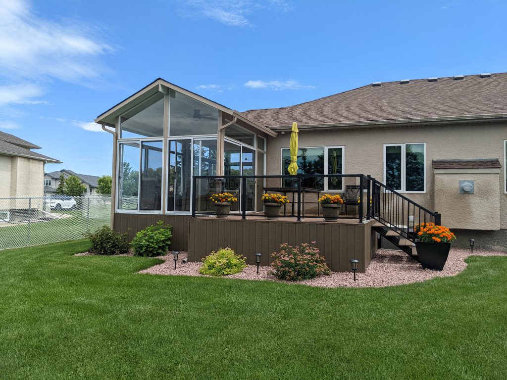 Two-tone gable sunroom & side deck