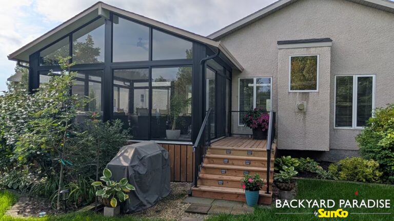 Black gable sunroom with hybrid roof system installed in Island Lakes, Winnipeg
