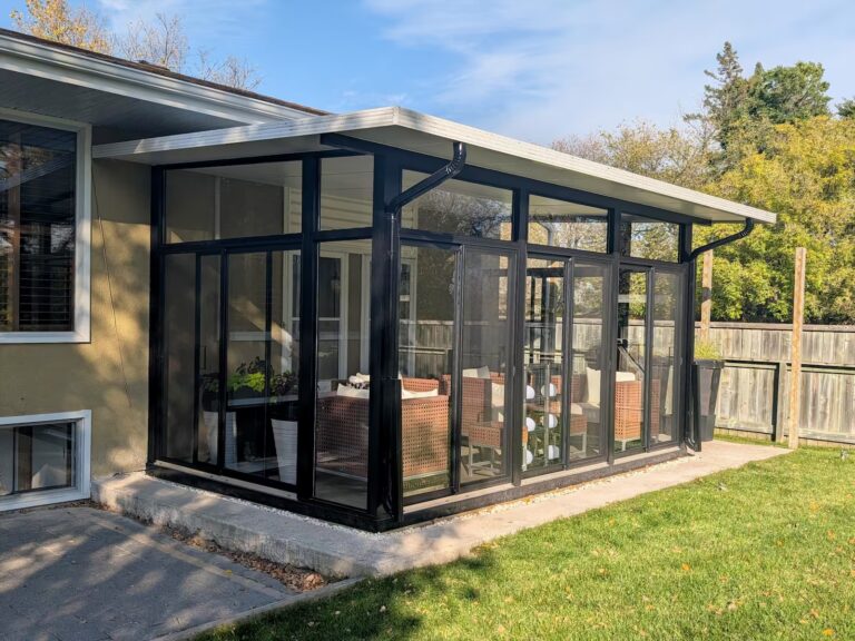 Black studio sunroom on grade built in Westwood, Winnipeg
