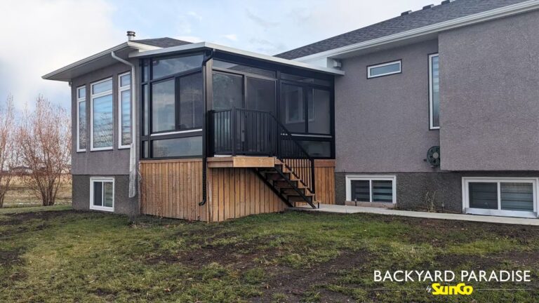 Black studio sunroom with black aluminum railing built in Springfield, Manitoba