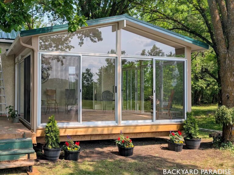 Sandalwood and white gable sunroom with custom color roof fascia and gutters in Seven Sister Falls, Manitoba