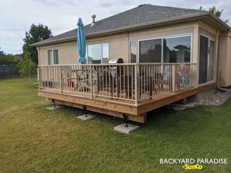Treated lumber deck and aluminum railings in River Park South, Winnipeg