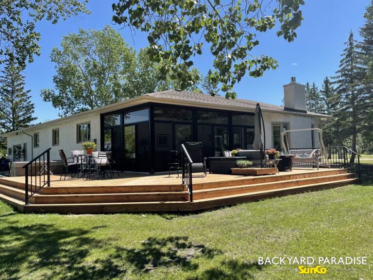 treated lumber deck with black aluminum railings in st andrews manitoba
