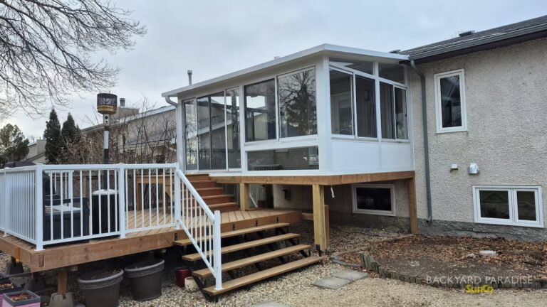 white elevated studio sunroom treated lumber deck whyte ridge winnipeg