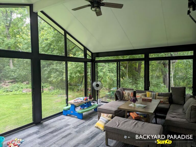 black gable sunroom with black aluminum railings la salle manitoba